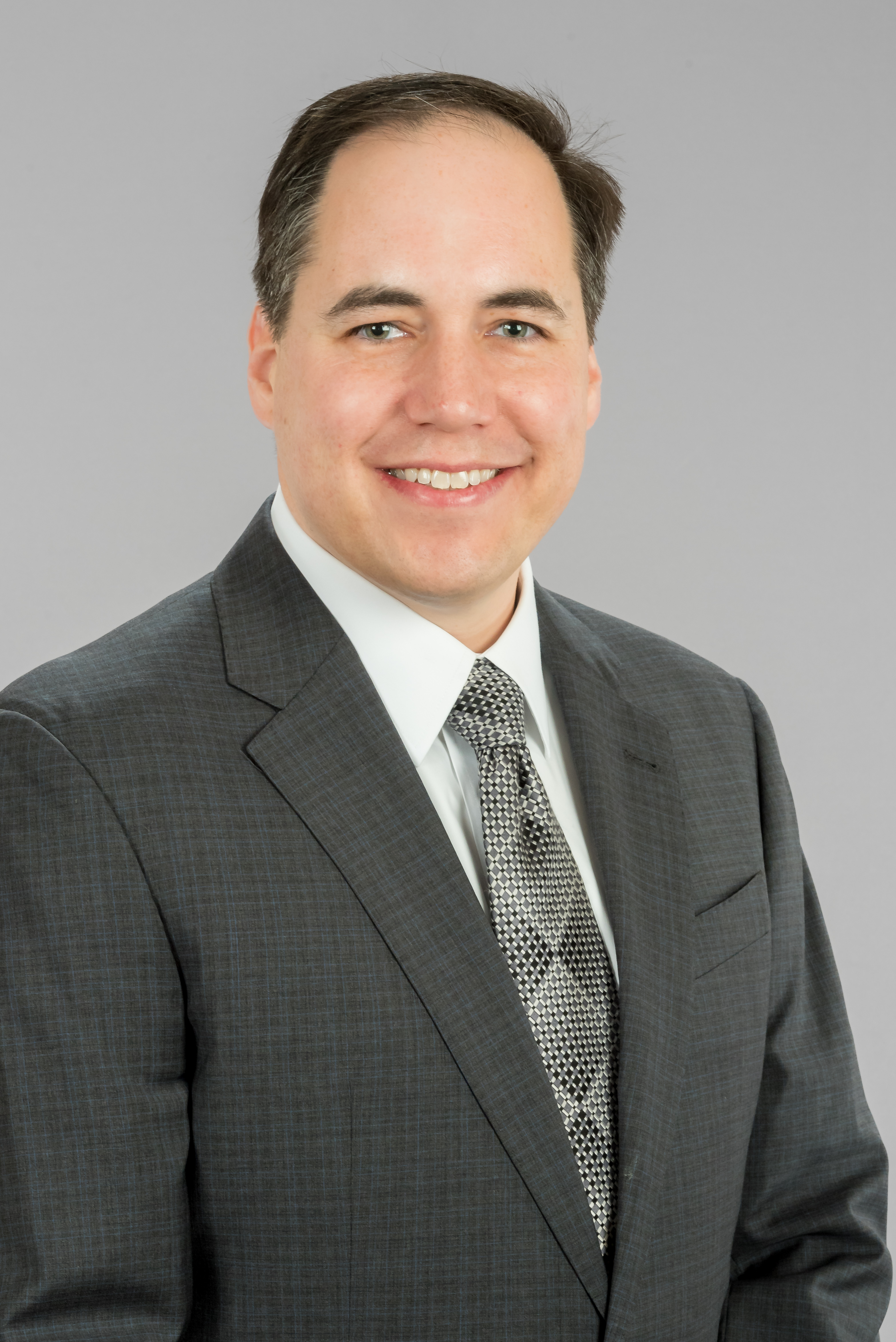 Picture of man in grey suit